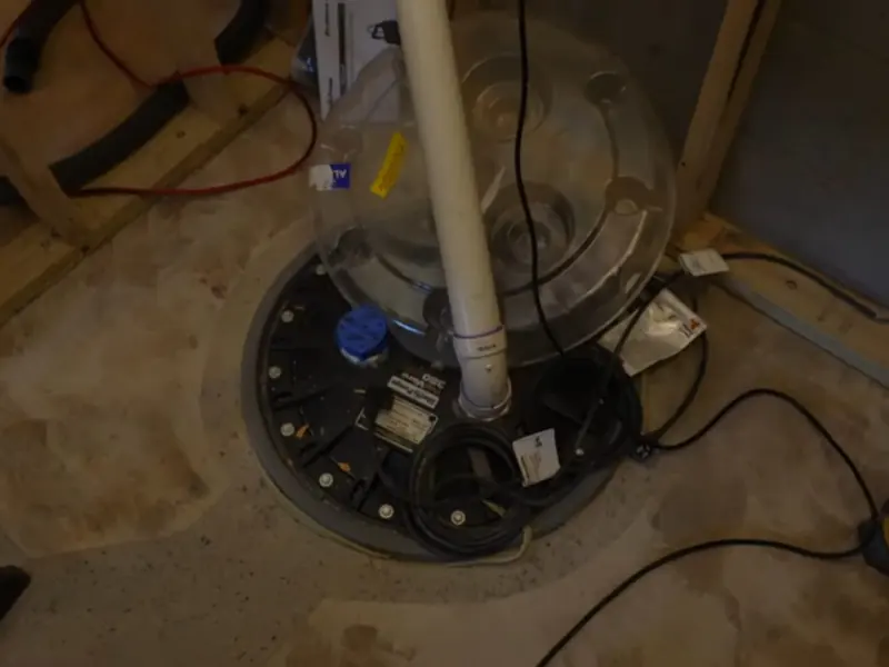 Basement rough-in plumbing with exposed drain and supply lines for Sump Pump Installation & Repair in Castle Rock, CO