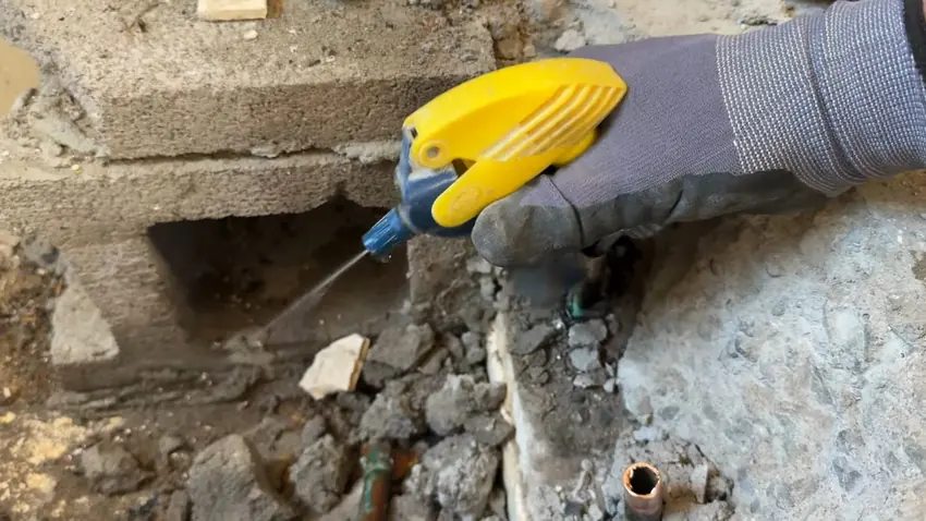 Opened concrete floor exposing plumbing during slab leak repair for Plumber in The Meadows, Castle Rock, CO