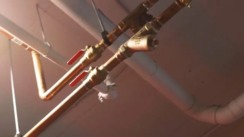 Pex and copper pipe fitting connection during repiping work for Plumber in Acres Green, CO